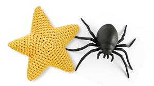 A knitted star and a spider toy
