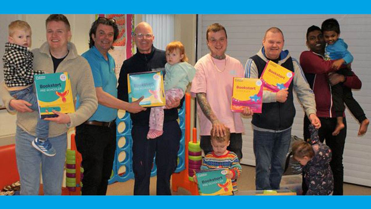 Keith with dads and their children at Surestart Brownlow Lurgan