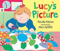 A book cover of the book “Lucy’s Picture” showing a little girl, about three or four years old with a yellow apron on, creating a picture using bits of brightly coloured paper