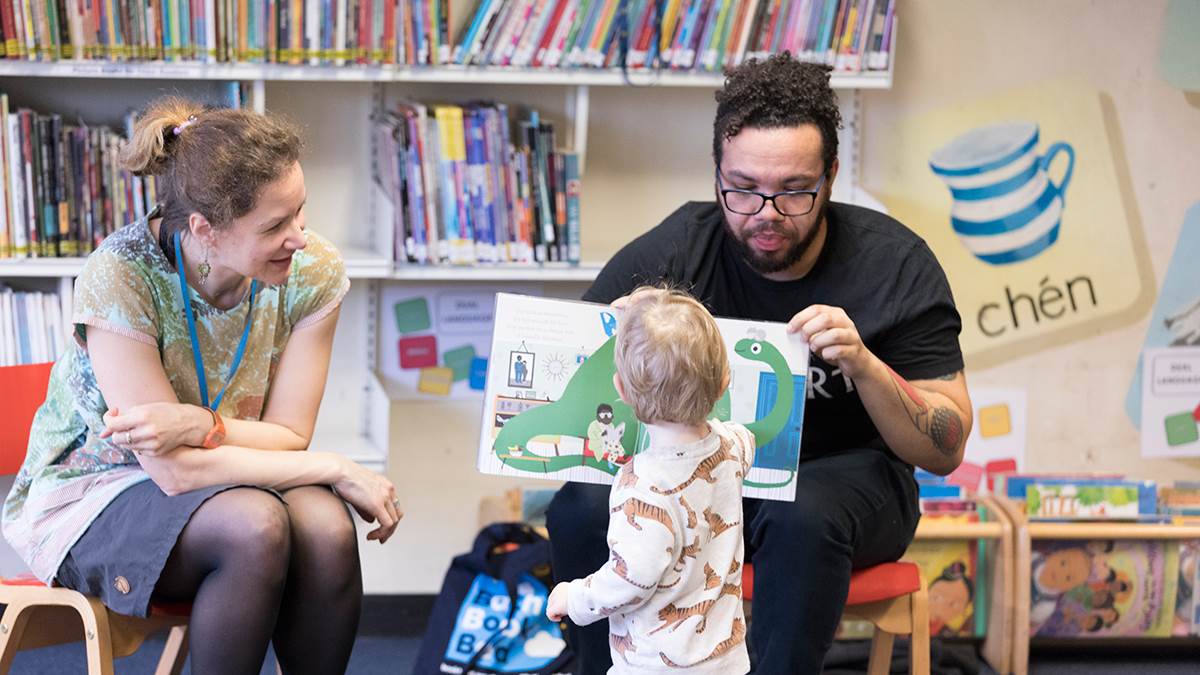 Practitioners leading a storytime at a library