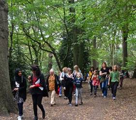 A guided walk in Queen's Wood where Red Leaves is set.