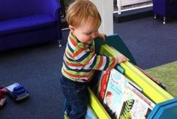 Kate's little boy, Albie, enjoying his local library