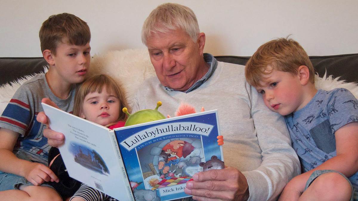 Nick Butterworth reading with his grandchildren