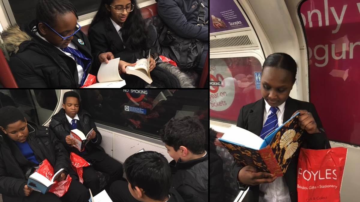 St Augustine's students reading on the London Underground