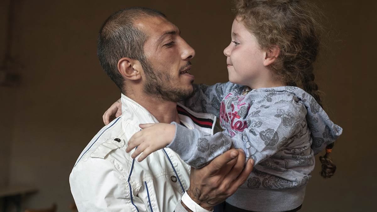 Refugee father and daughter